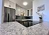 Granite countertops and stainless steal appliances make your kitchen luxurious