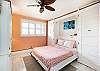 Second bedroom with warm comfy hues to put you into full relaxation