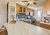 Embrace the comfort paradise provides while savoring a delightful meal, from your full kitchen