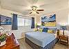 Drift off to sleep in this stylish bedroom while watching your favorite shows