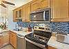 Cook up island inspired meals in this fully equipped, modern kitchen