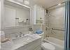Refresh in this spa like bathroom featuring sleek finishes