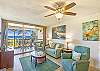 Chic and cozy comfort awaits you in the living room with a spectacular view of the ocean