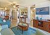 Relax in this tropical inspired living room with ocean breezes and island charm