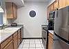 Gorgeous kitchen with stainless steel appliances.