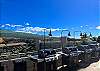 Grilling with a view at the roof top barbecue. A taste of paradise accommodated by panoramic Maui landscapes.