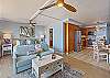 Chic and cozy comfort awaits you in the living room with a spectacular view of the ocean