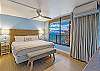 Serene setting in your second bedroom with warm and calming hues.