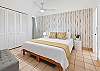 A cozy sanctuary with Hawai‘i inspired textures and calm energy.