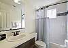 A full bathroom with tub/shower combo serves Bedroom 2.