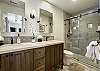 Large ensuite bathroom with oversize walk-in shower. Fluffy towels and essential soaps included!