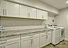 Each unit has a large laundry center with full size washer and dryer. Laundry detergent is provided.