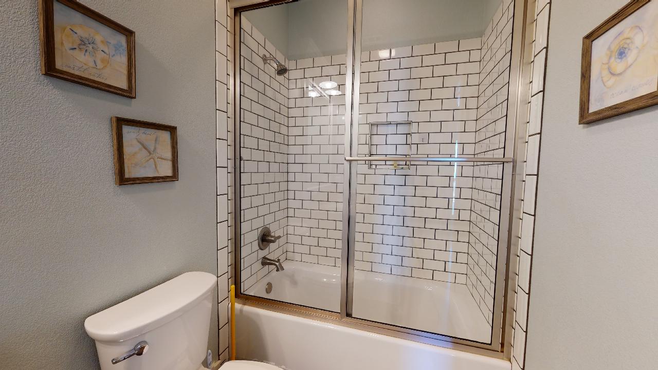 Guest bathroom located upstairs