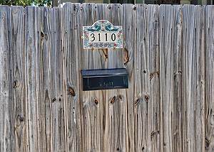 The front gate where the parking is located is right on Pass-A-Grille Way. The address is attached to the Gate at a visual height with the mailbox
