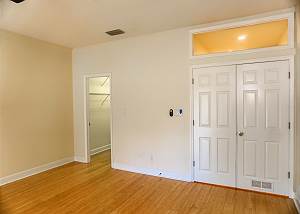 View from the Master Bath entry out toward the bedroom.