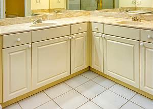 Wrap around cabinets, double sinks and counter space in the Master bath