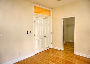 Double entry doors, this is a split plan, your master bedroom is to the right at the top of the stairs.