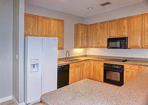 Dishwasher, Stove, Microwave, Refrigerator and plenty of storage space above and below for your dish ware.