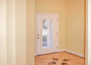 Front door foyer entry just off of the dining and living room.