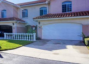 As you arrive to your Gulfport home there is parking in the garage and ample space in the driveway for guests.