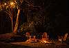  After a day at the beach or relaxing by the pool, unwind beside the wood-burning fire pit with s’mores and your favorite refreshments—an ideal setting for cozy coastal evenings and memorable vacation nights.