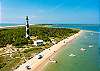 Cape Lookout National Seashore offers a true off-the-grid coastal experience with miles of undeveloped shoreline, wild horses, and the striking black-and-white Cape Lookout Lighthouse. Located approximately 12–15 miles from Beaufort, NC (about 20–30 minutes by passenger ferry or private boat), it’s an easy and memorable day trip. Visitors typically depart from Beaufort or nearby Harkers Island by ferry. Once on the island, enjoy shelling, fishing, beachcombing, and seasonal lighthouse climbs. There are no stores or restaurants on the island, so plan ahead and bring food, water, and beach essentials.