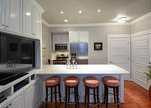 Full kitchen with stainless steel and granite