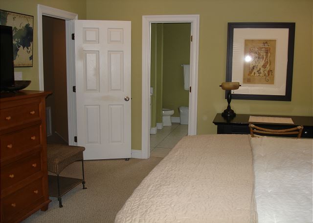 Master bedroom into the adjoining bath