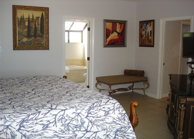 Master king bed adjoining bathroom