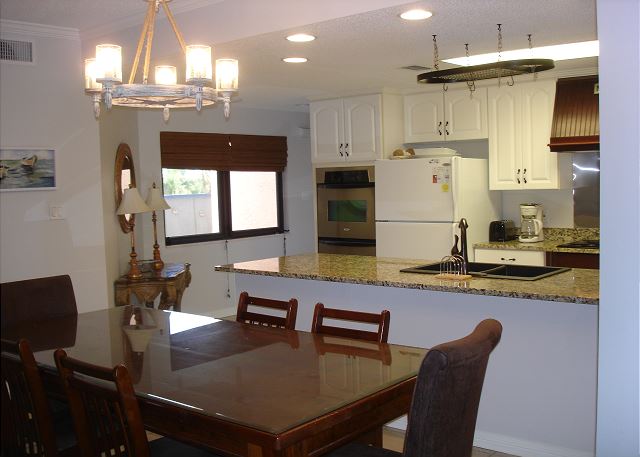 Dining area looking into kitchen