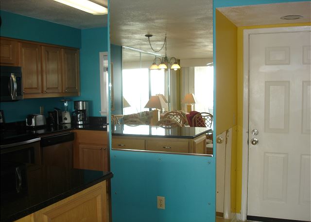 Front door and kitchen