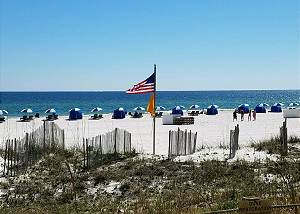 Beach in front of complex-Descriptive
