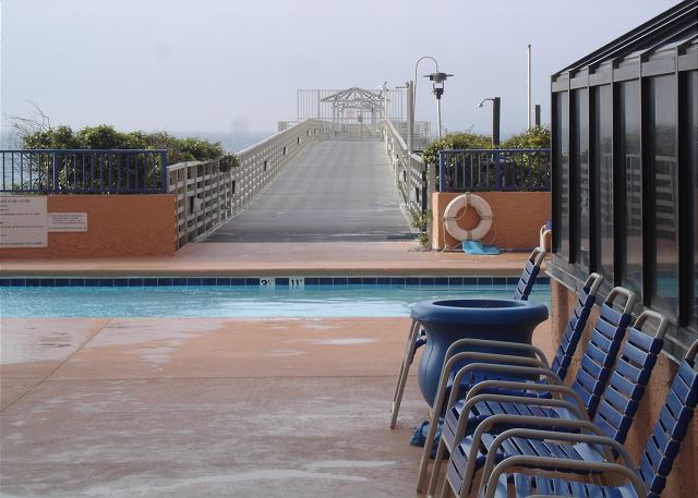 Outdoor pool entrance to pier
