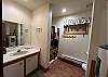 Full bathroom with step in shower