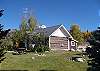 Fire pit, picnic table and grassy area