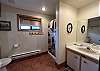 Full bathroom with step in shower