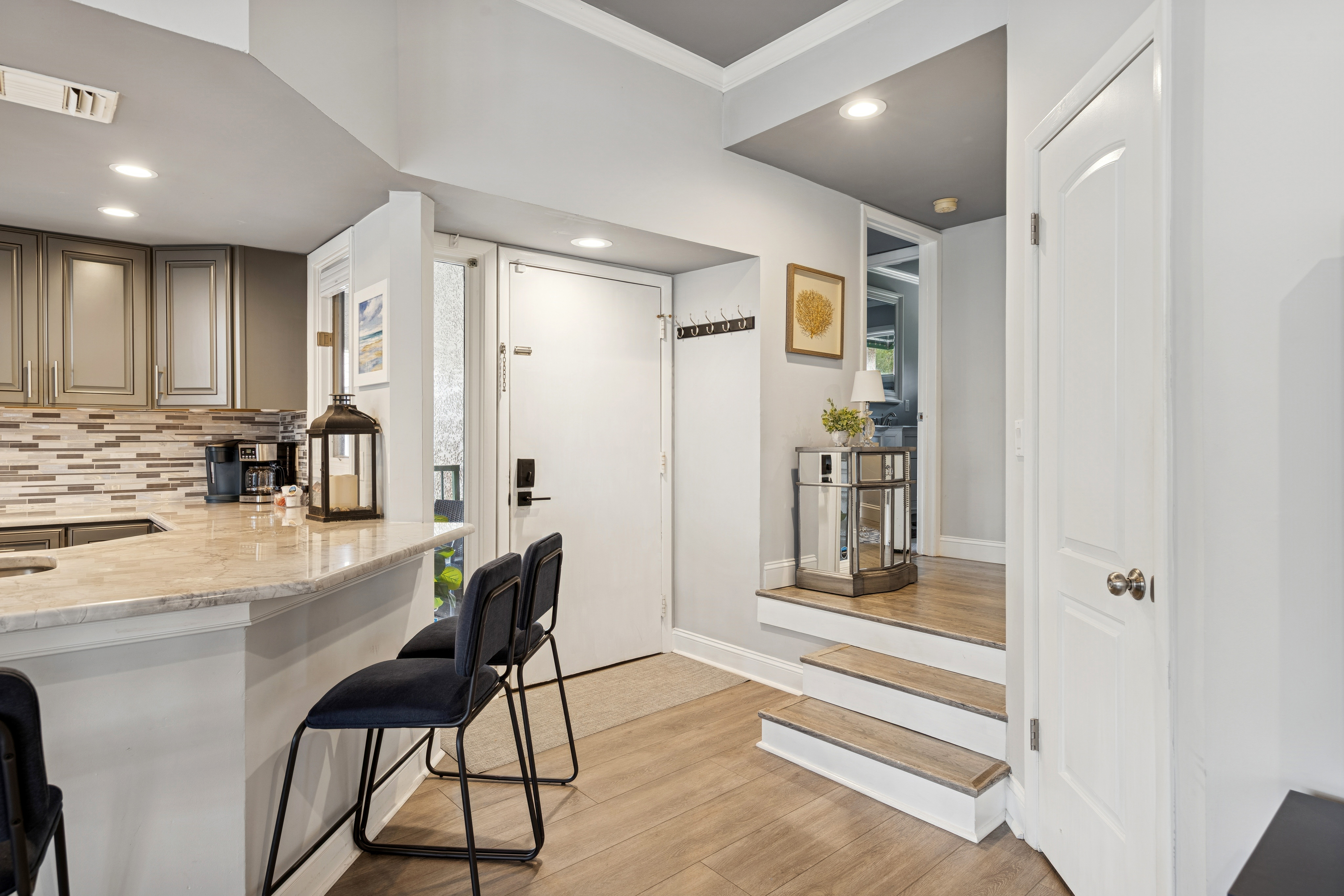 Inviting Entryway Flowing into Gorgeous Kitchen