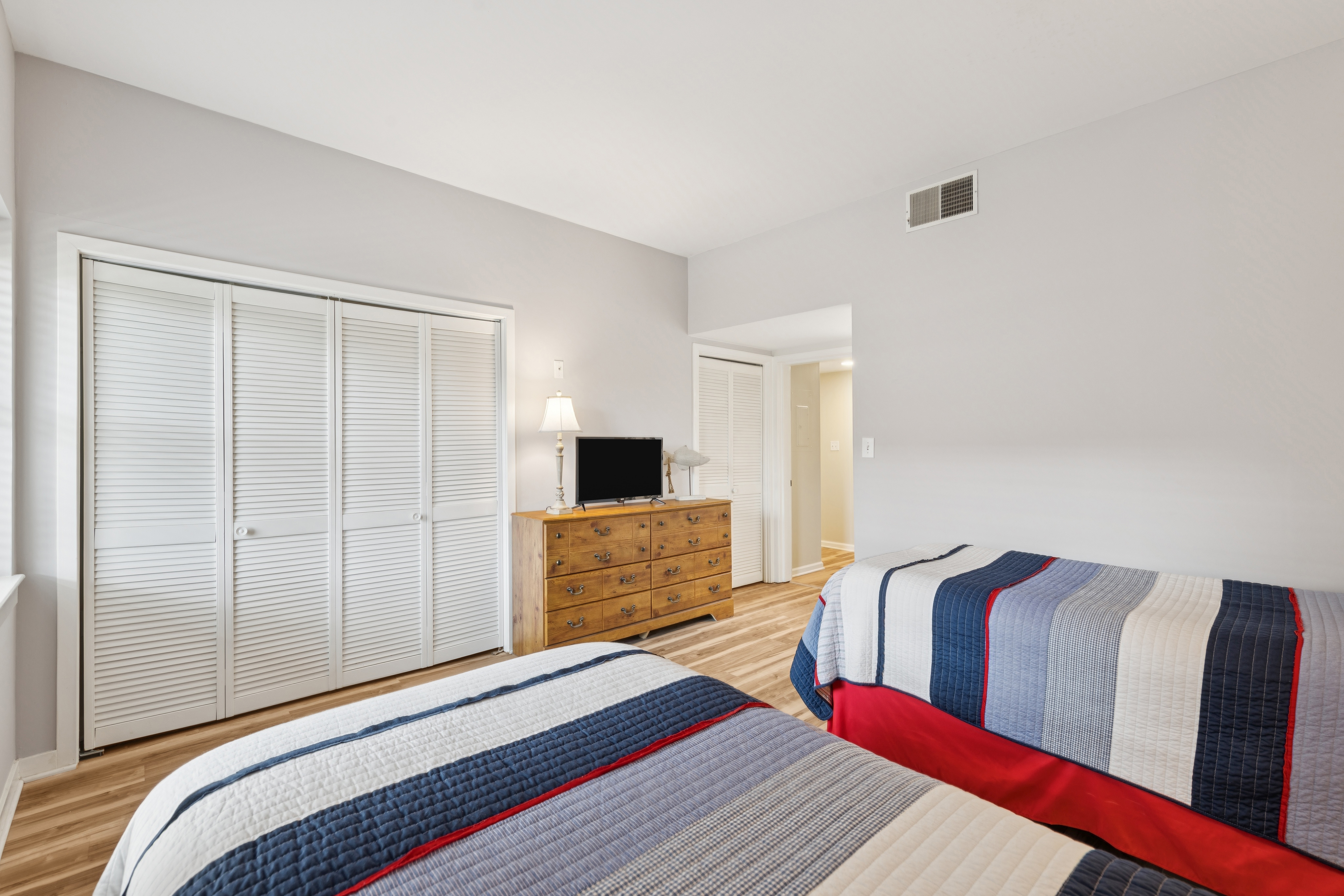 Nautical, Bright, and Airy Secondary Bedroom