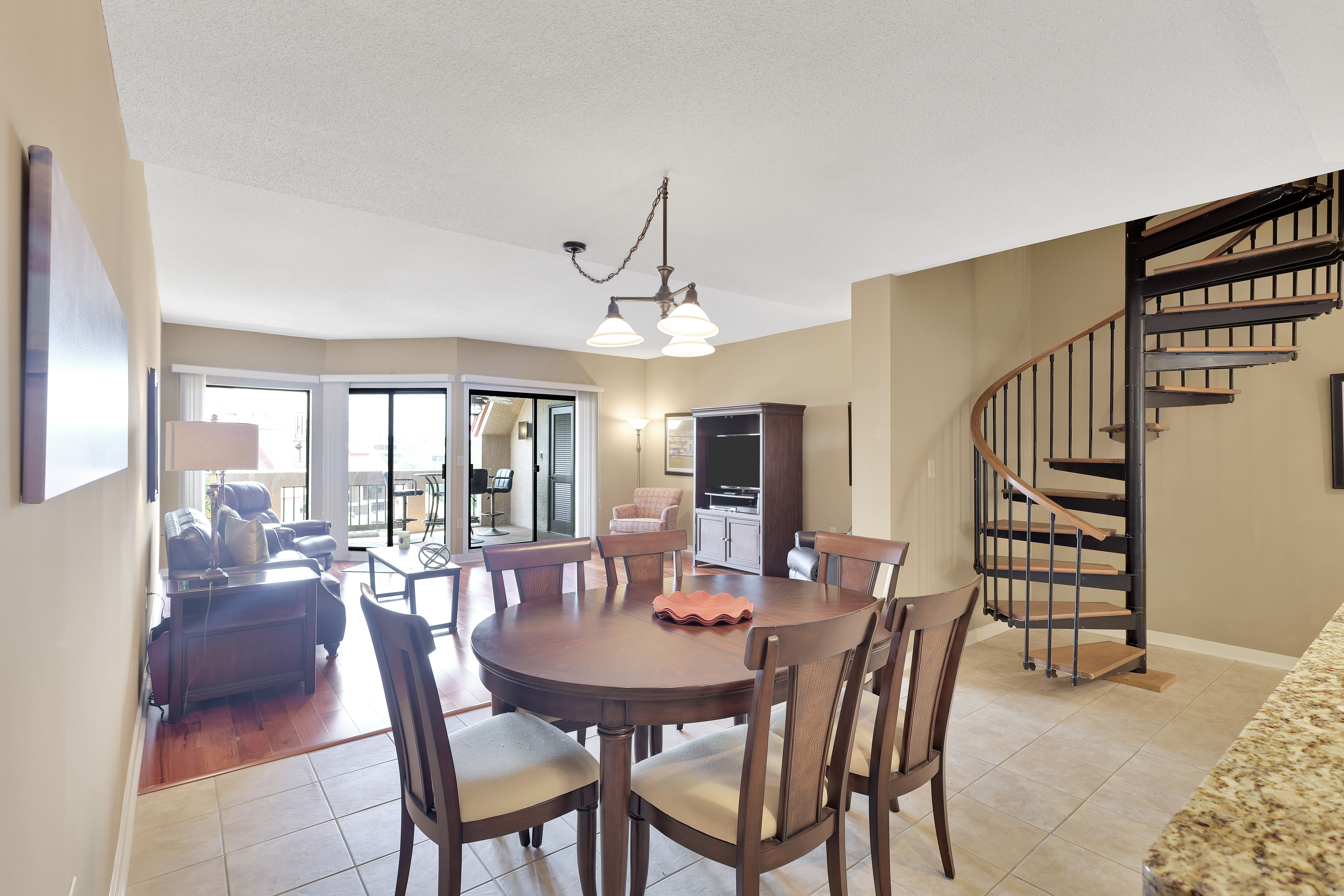 Open Layout Combining the Kitchen, Dining Area, & the Living Roo