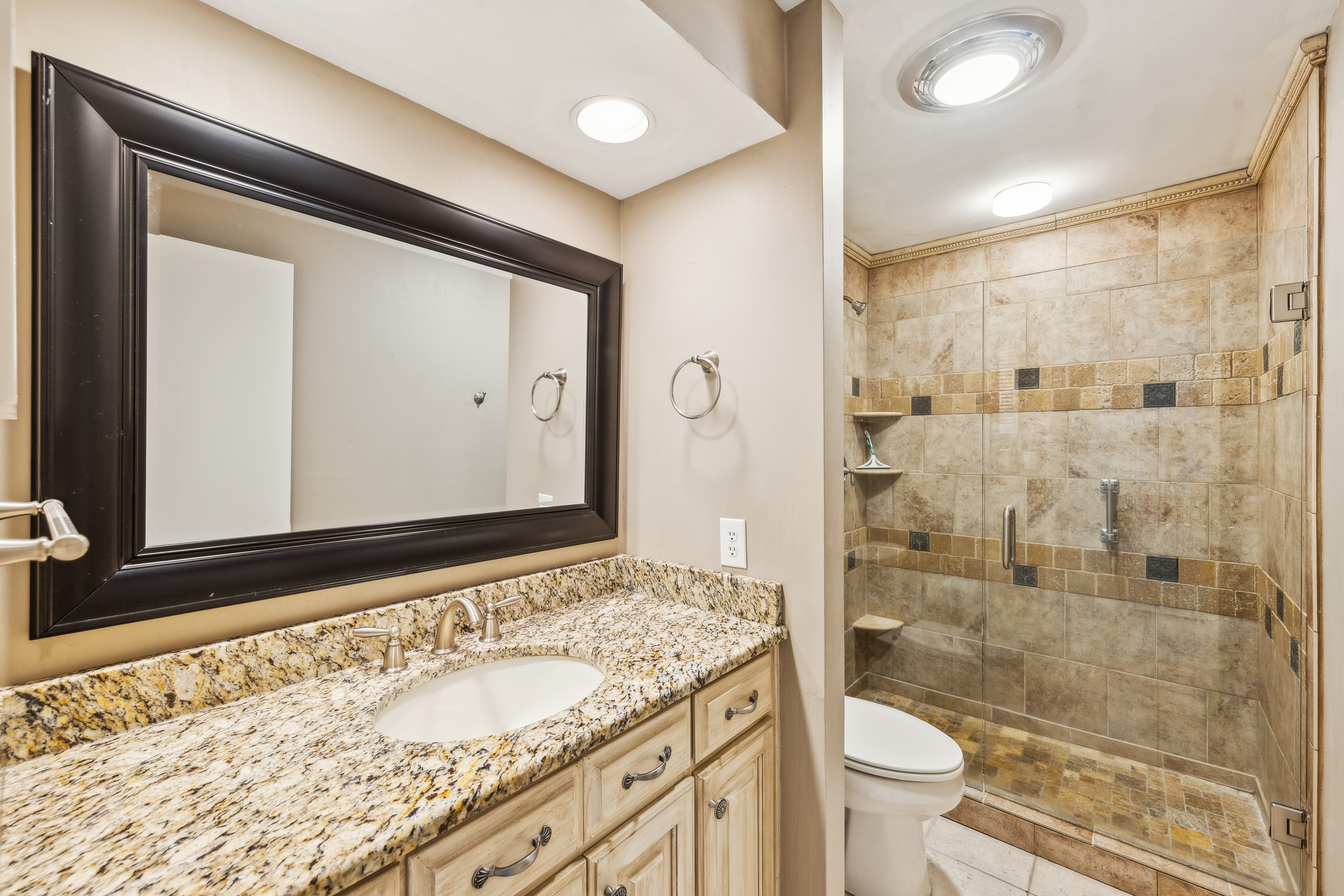 Elegant Primary Bath with Walk-In Shower & Plenty of Drawers