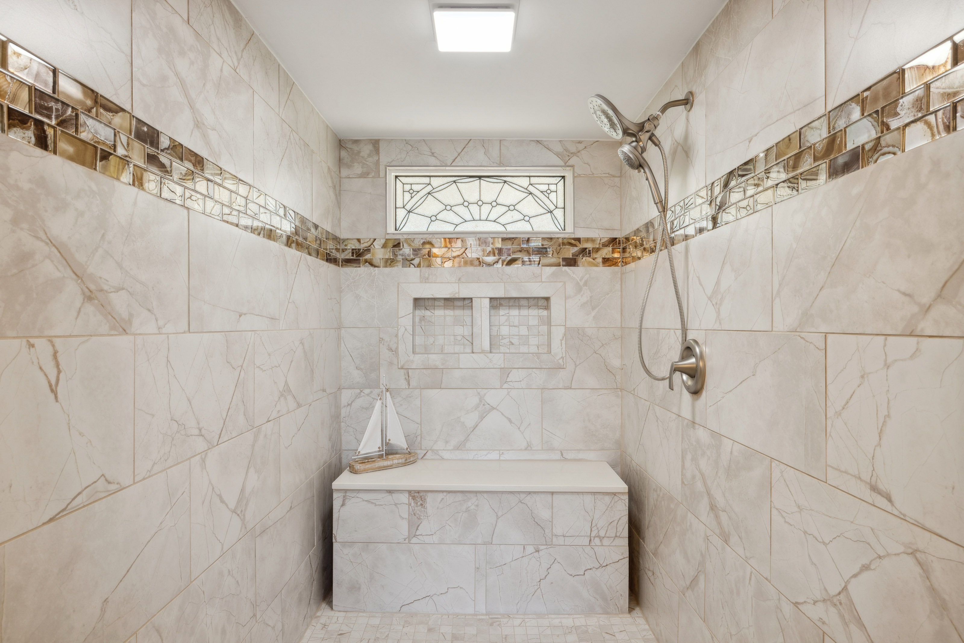Marble Walk-In Showe with a Seating Area - Take A Shower in Comf