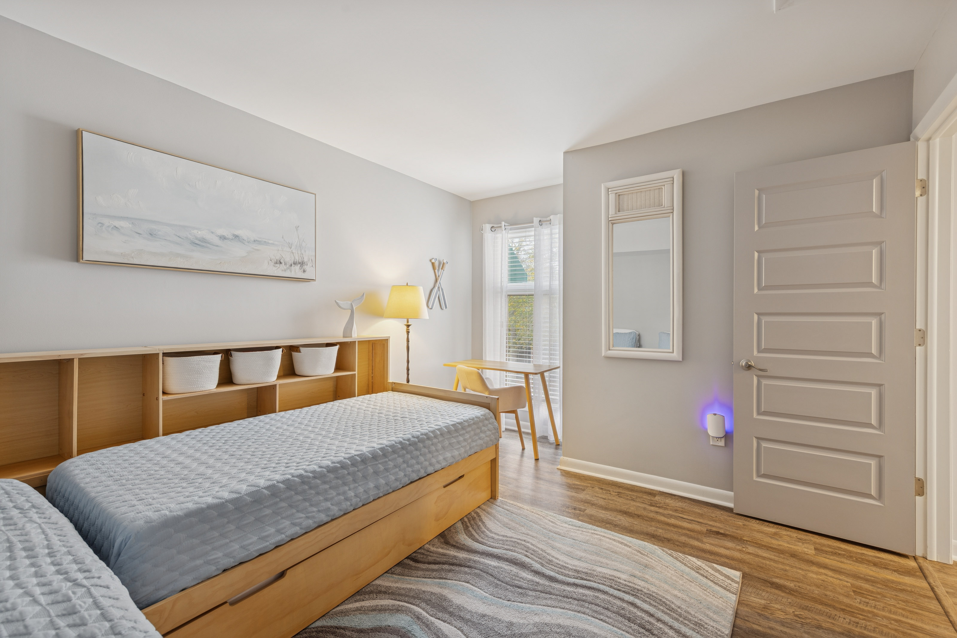 Spacious Bedroom with a Desk for Dun Activities