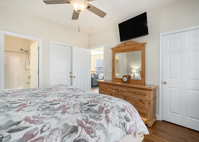 Primary Bedroom with King Size Bed and TV
