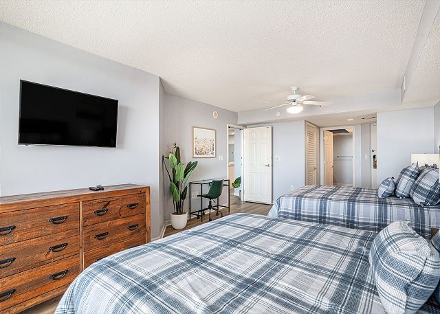 Primary Bedroom with 2 Queen Size Beds and TV