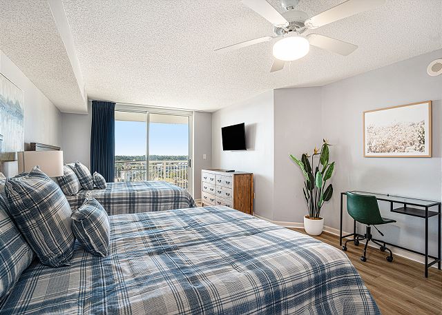Primary Bedroom with 2 Queen Size Beds and TV