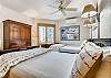 Twin beds in second bedroom with ensuite bathroom and Air conditioning