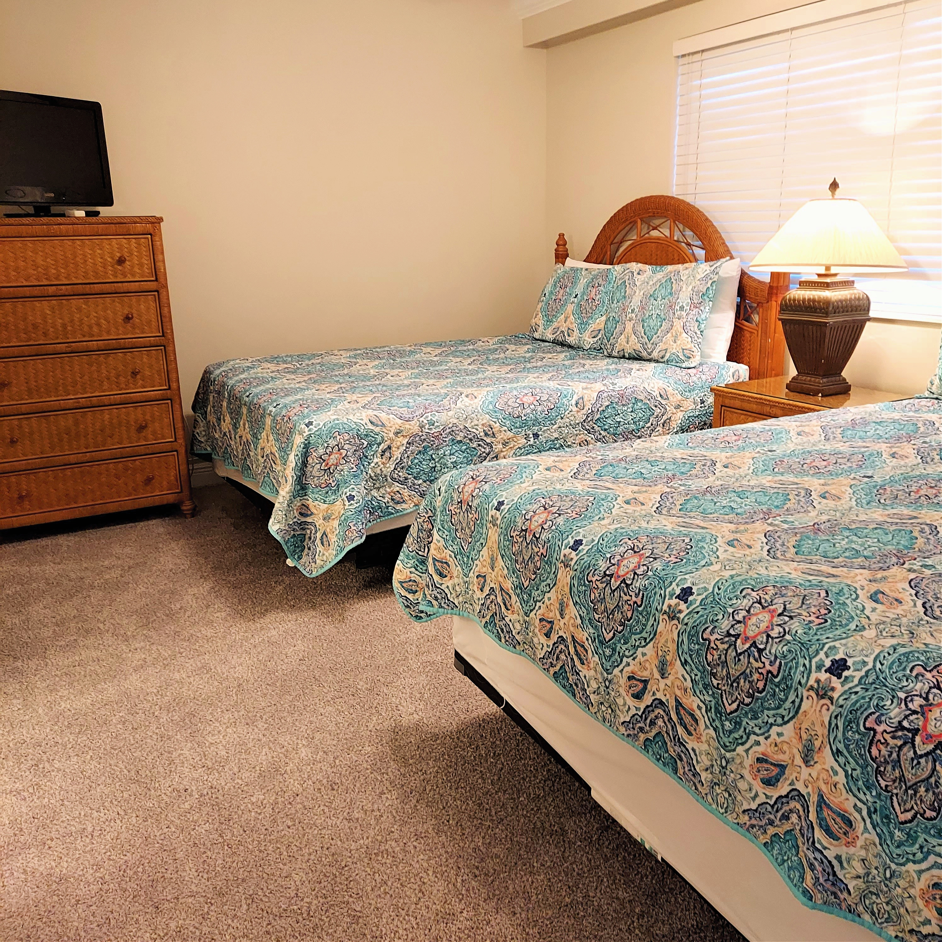 Double Queen Guest Bedroom with 26 Inch TV