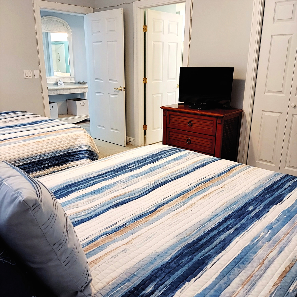 Double Queen Bedroom 32 Inch TV