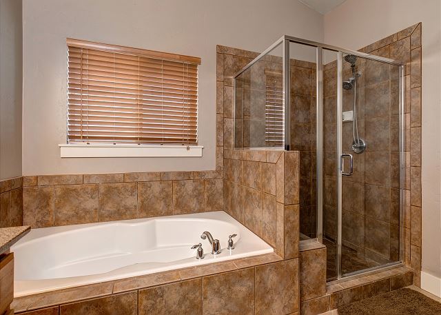Upstairs En Suite Master Bathroom with Separate Soaking Tub and Shower