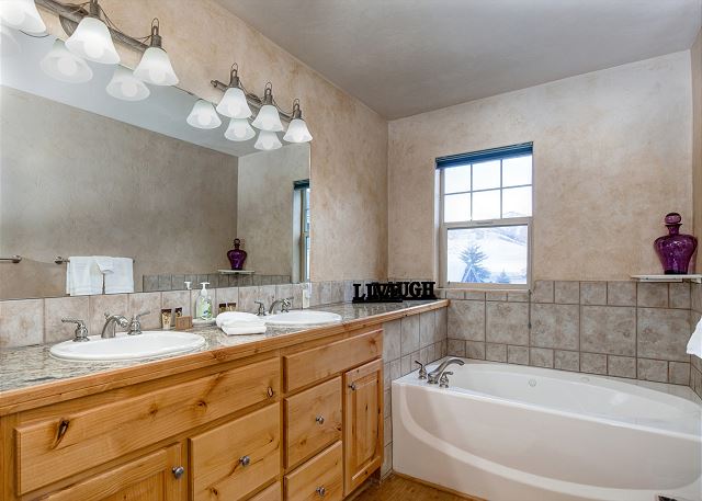 Upstairs Master En Suite Bathroom with Dual Sink Vanity and Separate Tub and Shower